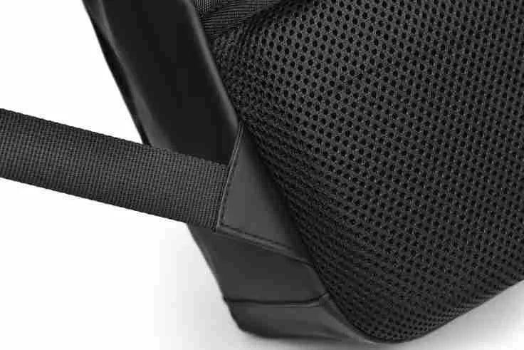 Simple black PU leather backpack with visible sewing thread detailing and large storage capacity