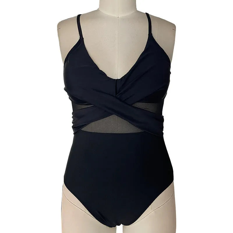Women's mesh spliced backless one-piece swimsuit in black with polyester lining, size S to 2XL
