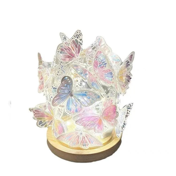 Butterfly night lamp with glass shade on raw wood base for bedroom ambience lighting