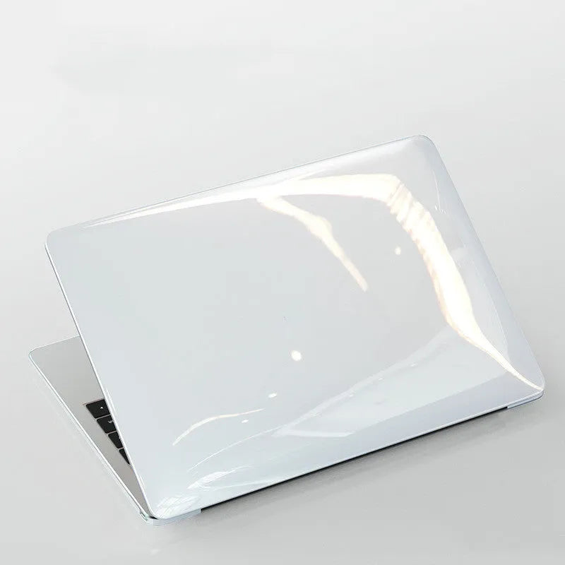Transparent PC protective case for MacBook Pro laptop showing close-fitting hard-shell design