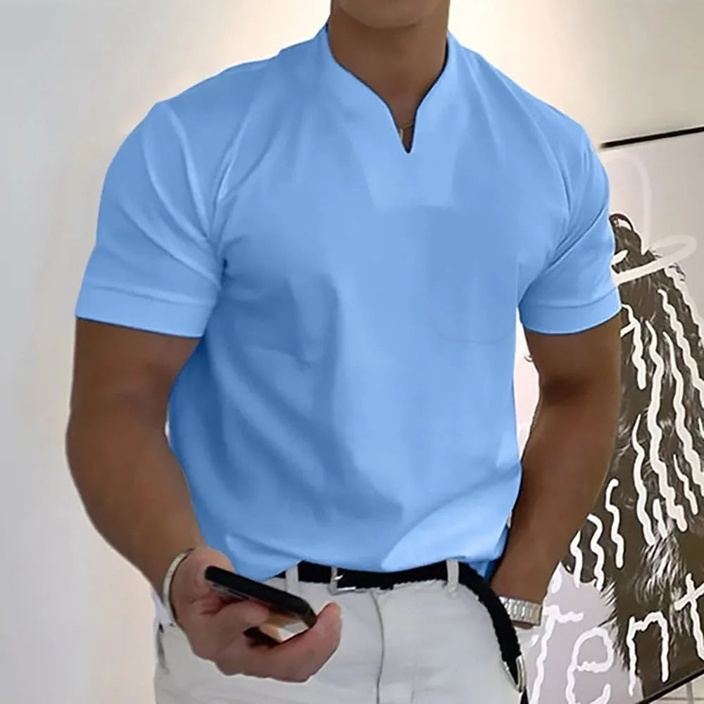 Men's loose fit short sleeve sports T-shirt with stand collar and pocket, available in 12 colours and sizes S to 5XL.