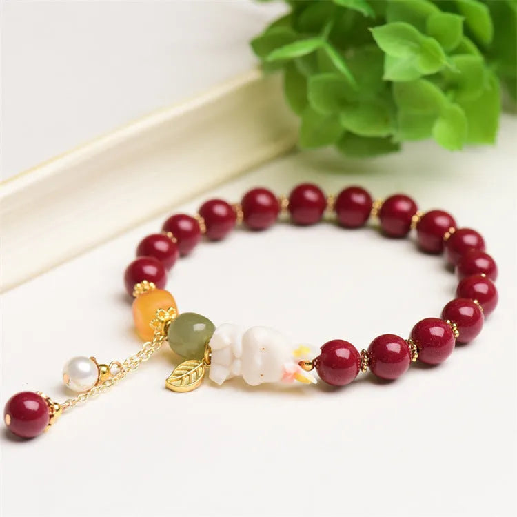 Tian Yu natural cinnabar bracelet with rabbit motif in traditional Chinese style