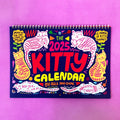 A2 size cat-themed wall calendar with monthly feline artwork on 200gsm paper
