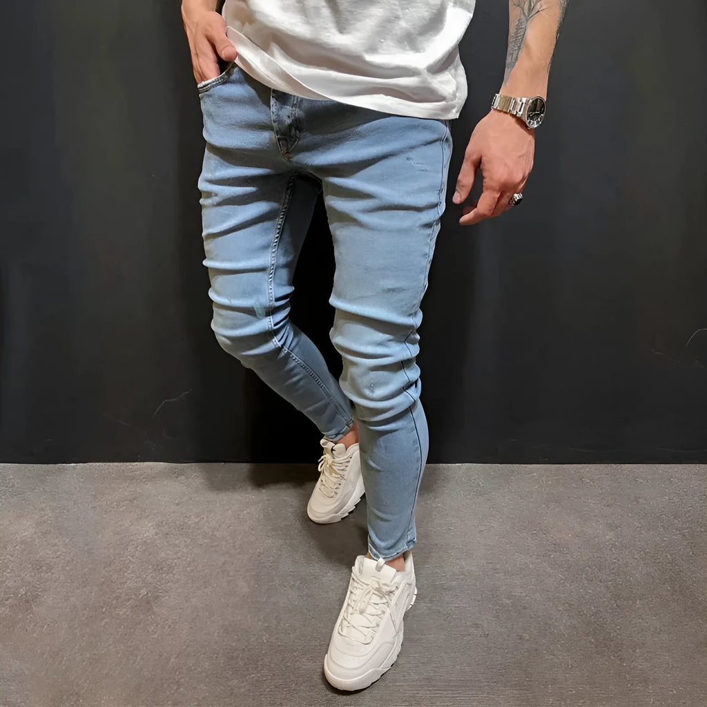 Men's blue polyester denim trousers with mid-waist cut and button placket, sizes S to 3XL