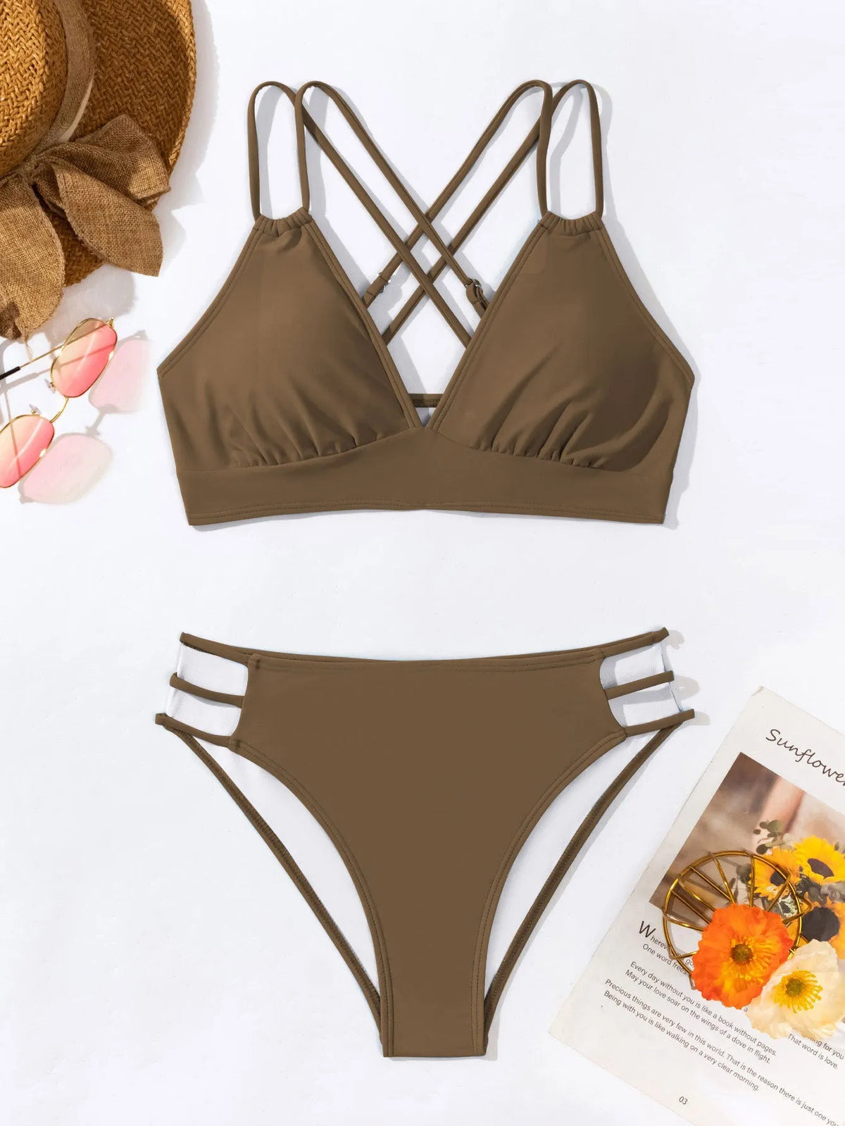 Adult women's black V-neck halter bikini with split-leg high-cut shorts.