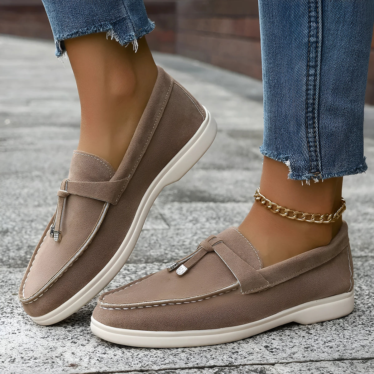 Canvas slip-on loafers in brown with round toe, rubber sole, and platform heel.