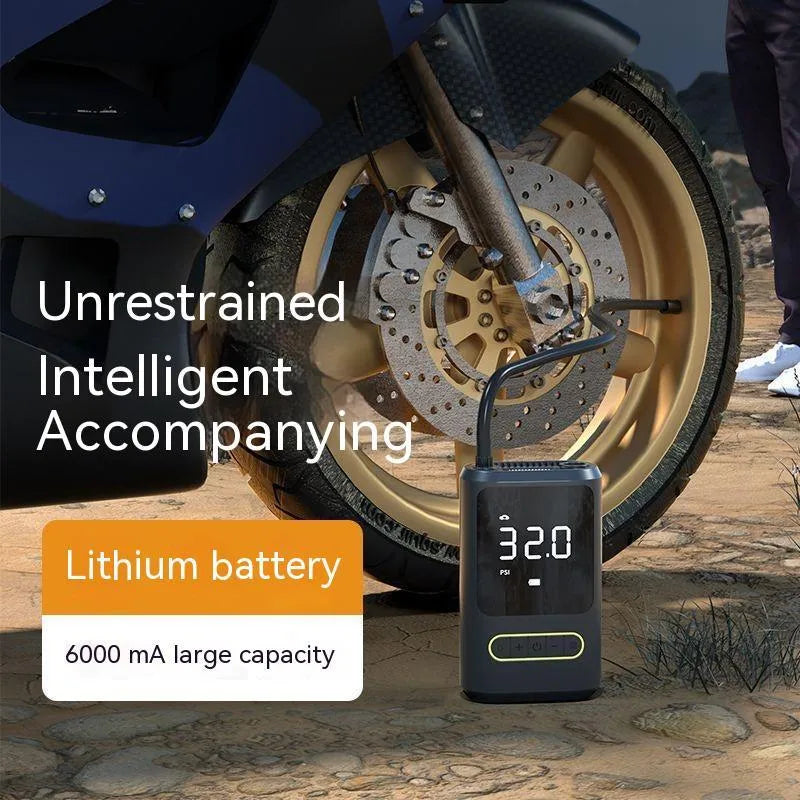Handheld wireless car air pump with digital display showing pressure reading, includes air hose and multiple nozzle attachments