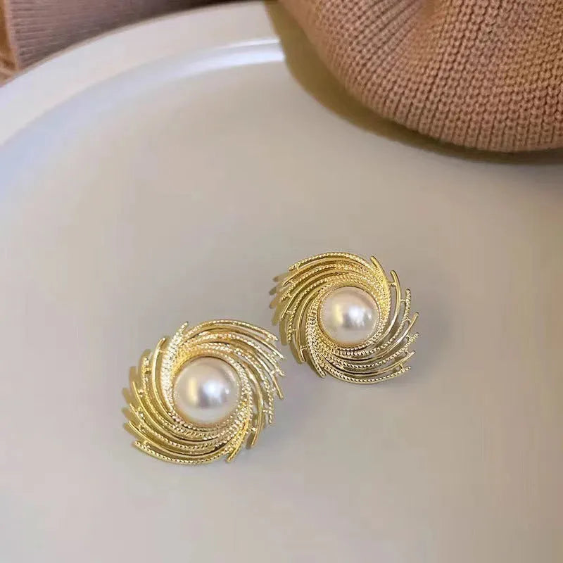 Women's vintage pearl earrings with exaggerated flower shape and electroplated alloy construction
