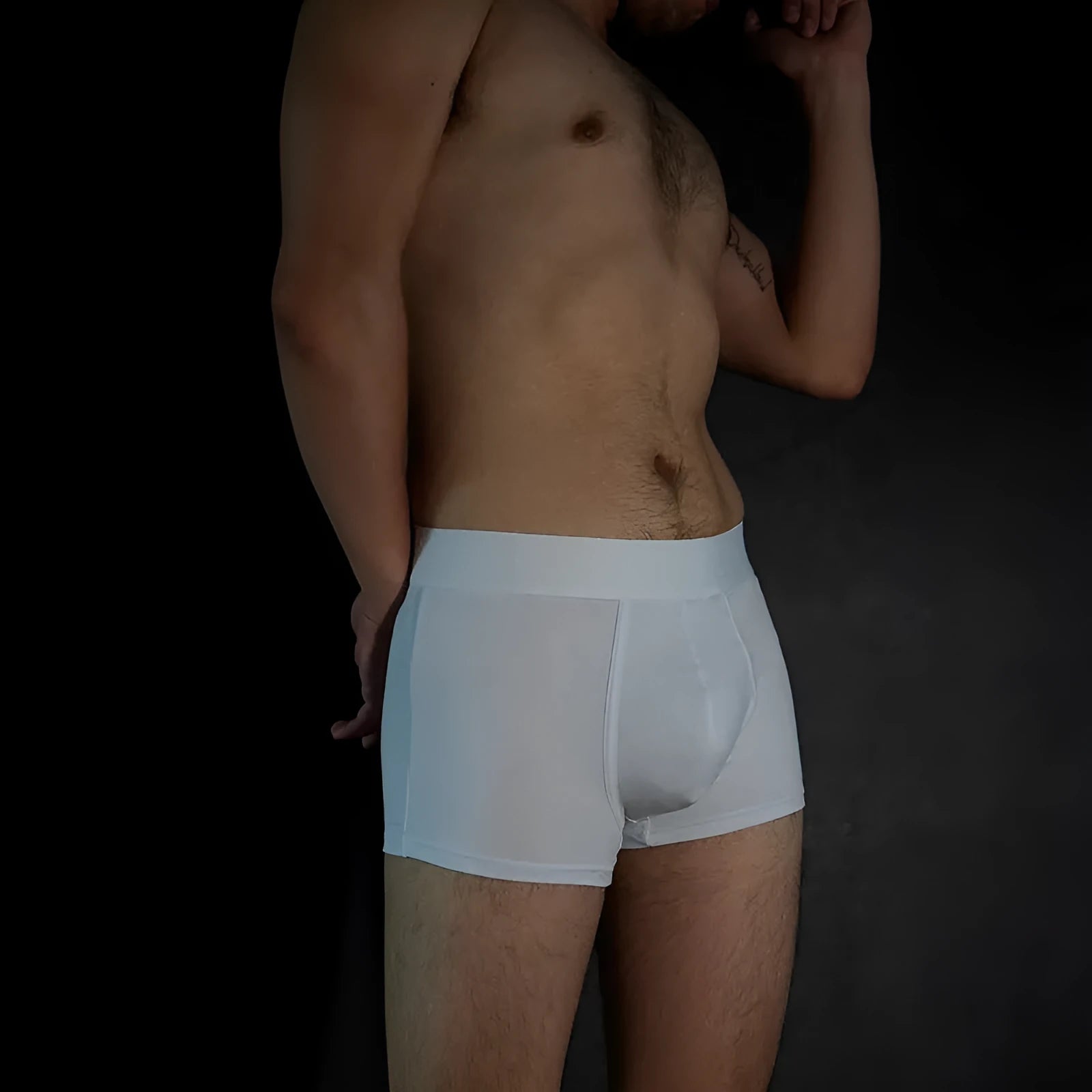 Men's solid colour cotton boxer shorts in black, white, silver grey and light green.