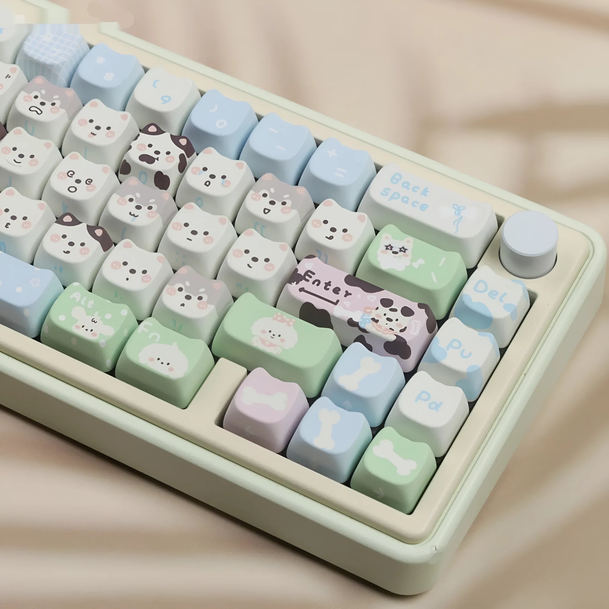 Colourful puppy character PBT key cap set for mechanical keyboards with 26 alphabetical characters.