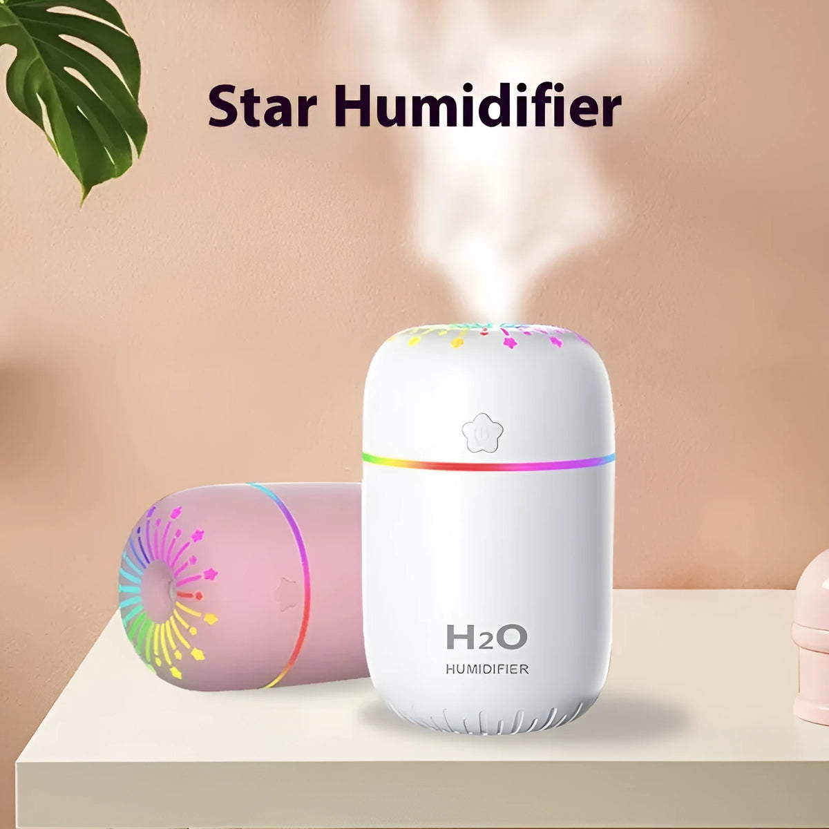 Fireworks A5 white mini USB humidifier with water tank on a wooden desk next to a laptop