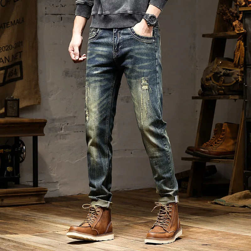 Man wearing retro coloured stretch cotton denim skinny fit jeans with a zip fly.