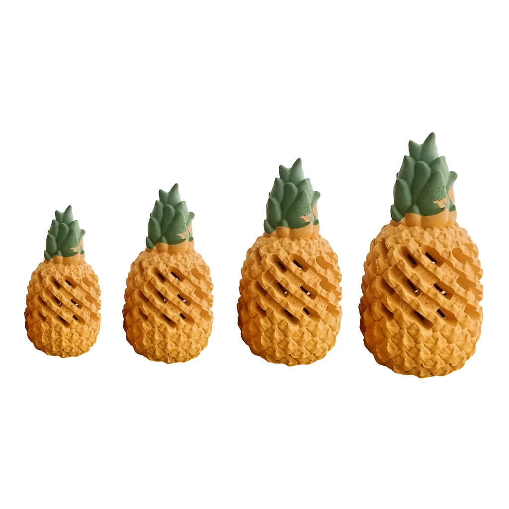 Yellow pineapple-shaped rubber dog chew toy with hollow treat section for small and large dogs