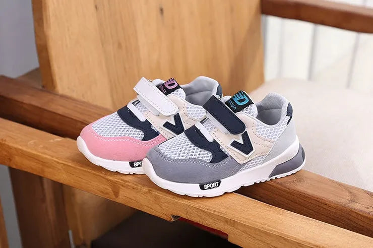 Girls running shoes with breathable mesh upper and TPR sole in grey colour