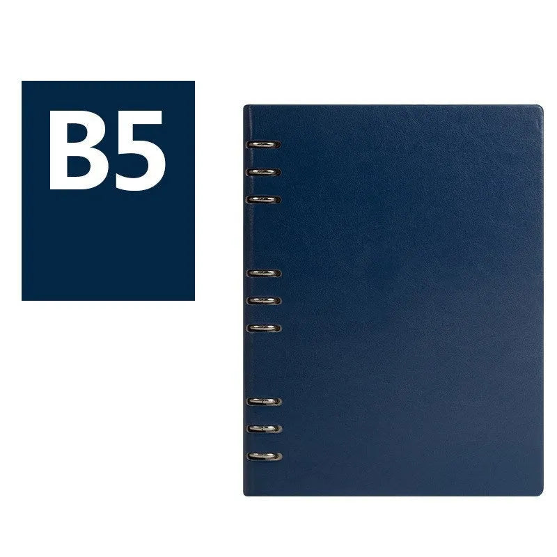 A5 loose-leaf business notebook with a black imitation leather cover, open to show beige paper.