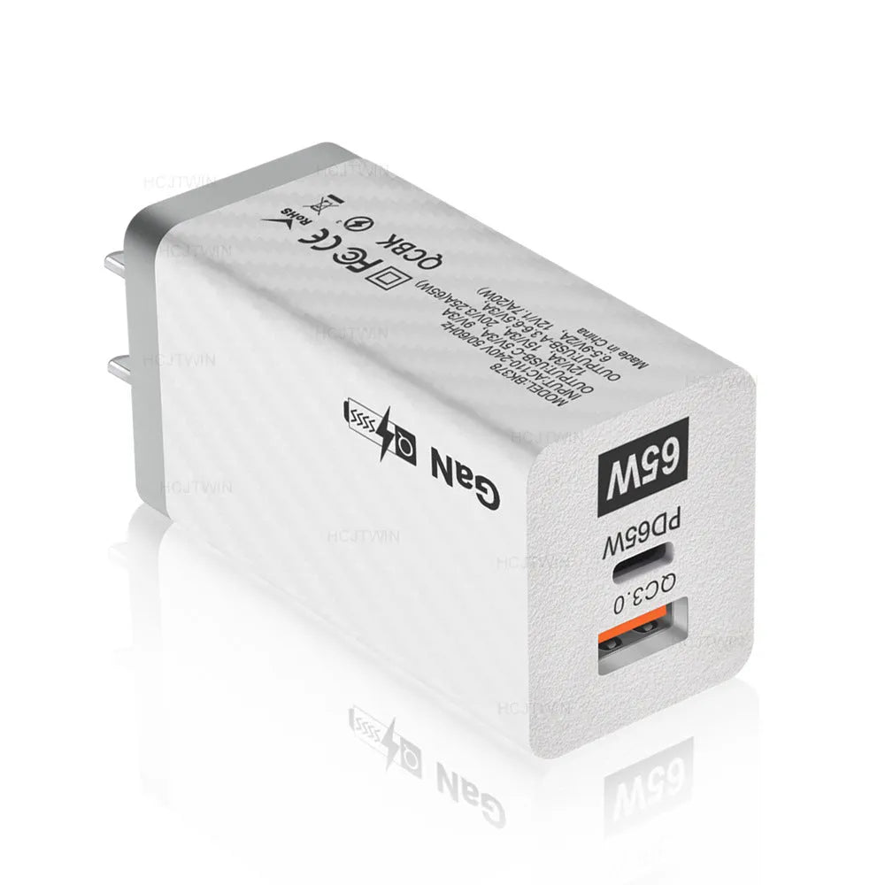 65W Gallium Nitride laptop charger in black with compact rectangular design showing USB+PD port