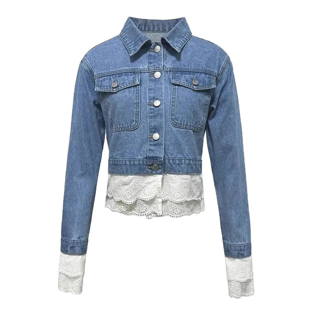 Blue women's denim jacket with white lace stitching on the front, long sleeves.