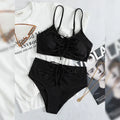 Black women's swimsuit with high waist bottoms and sleeveless top on mannequin