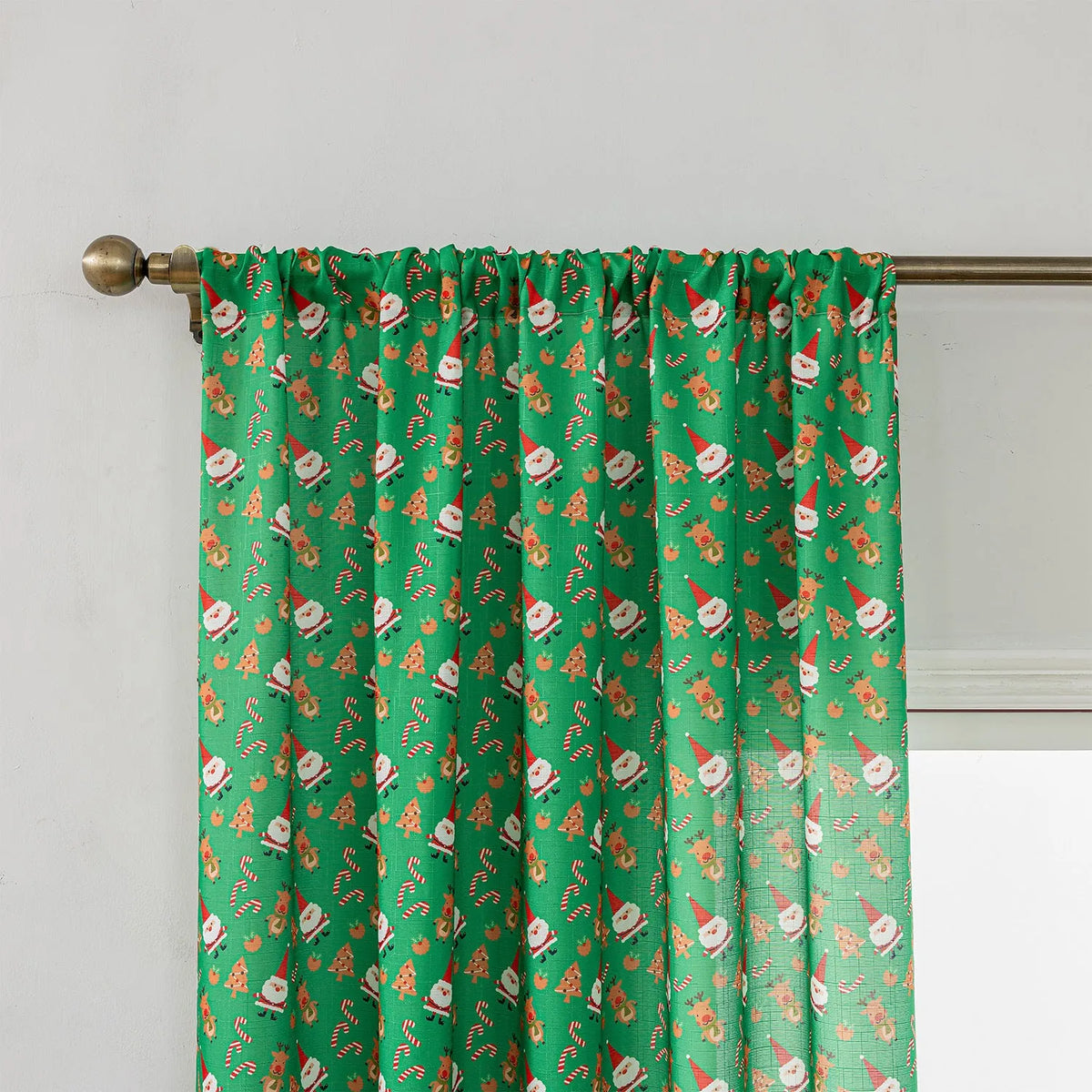 Green Christmas curtain with printed snowman and angel cartoon pattern