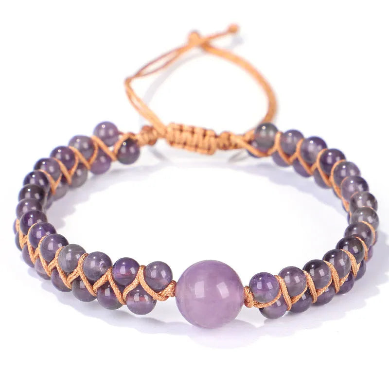Hand-woven geometric pull bracelet made from blue Tigereye stone beads with an adjustable slip knot.
