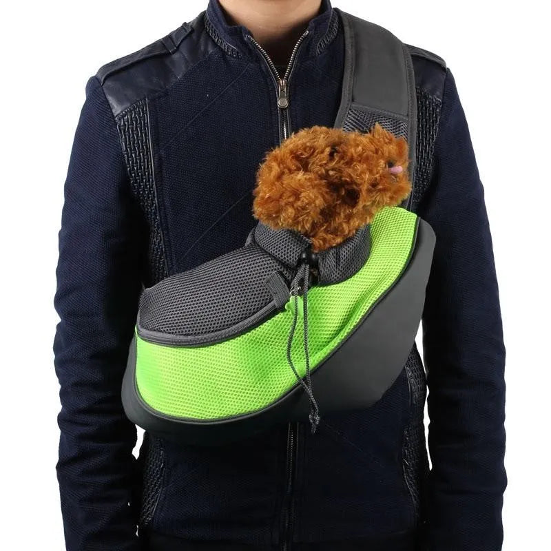 Blue pet backpack for a small dog, showing padded interior and shoulder straps.
