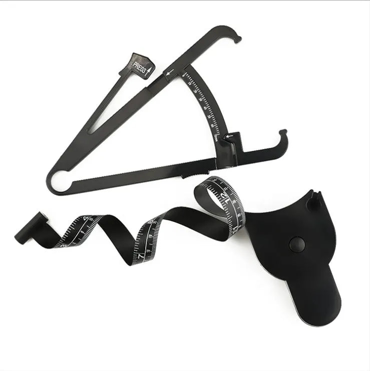Black ABS plastic body fat caliper with measurement scale and included flexible measuring tape.