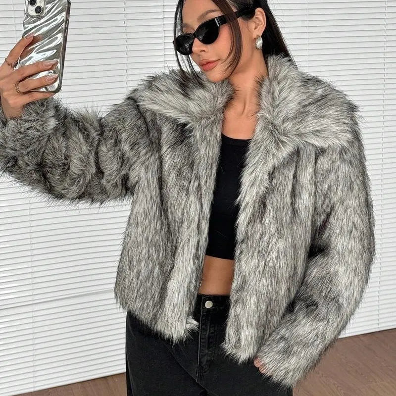 Short black artificial fur coat with a large fur collar, shown on a model.