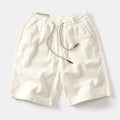 Men's khaki retro American cargo shorts with straight leg and multiple pockets