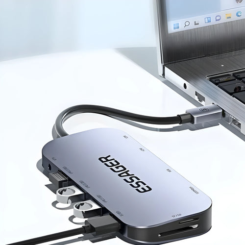 11-in-1 USB-C expansion dock with attached 20cm cable and gigabit ethernet port on a desk