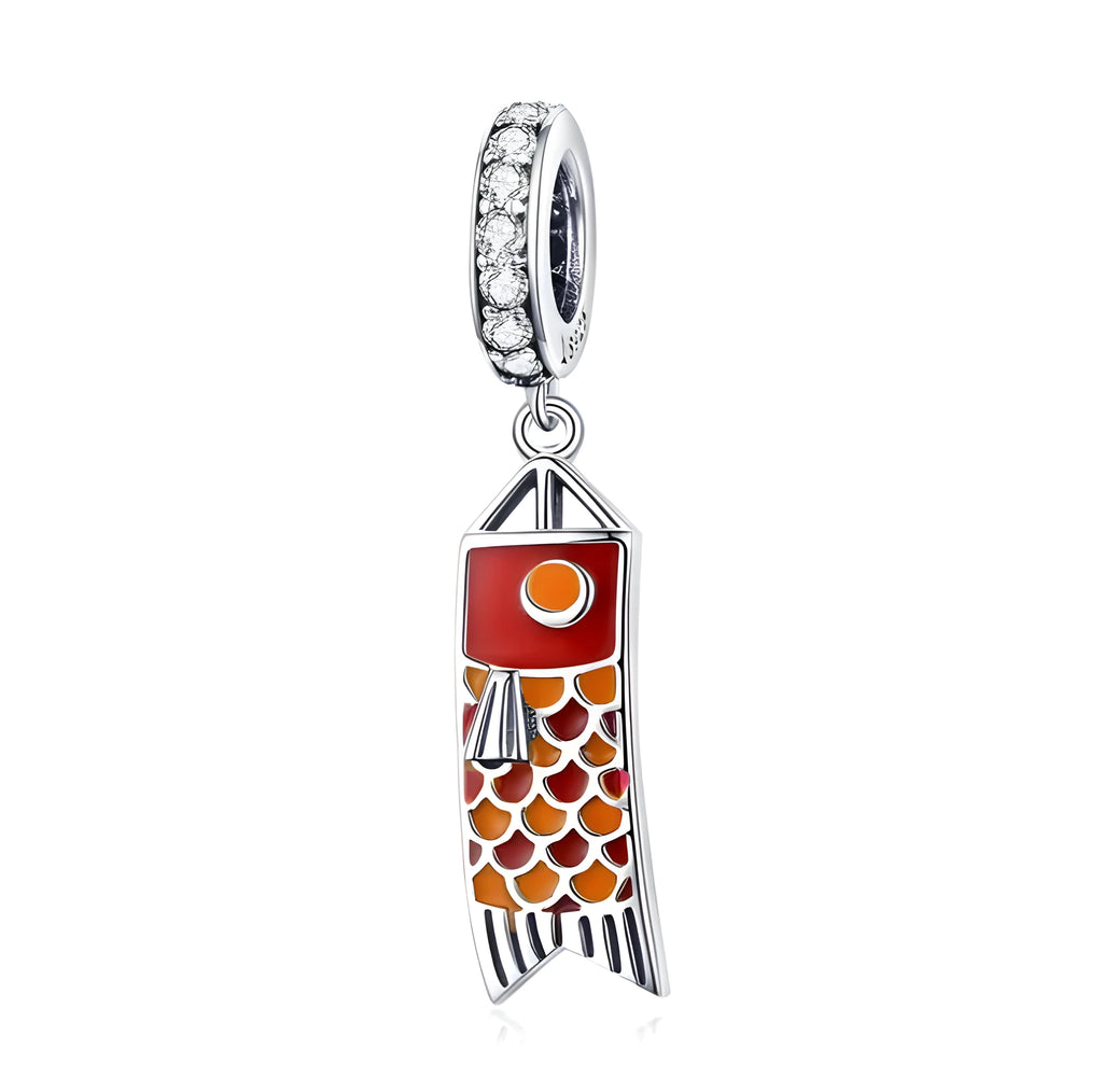 S925 sterling silver carp streamer pendant with zircon detailing on a dark background
