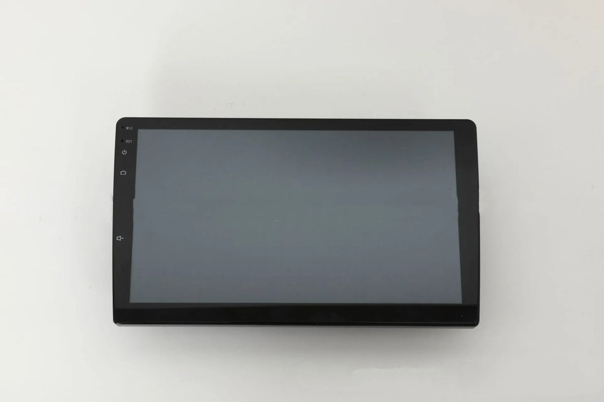 Black 10.1 inch universal Android car head unit with touch screen display on a trapezoidal panel