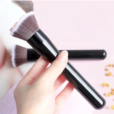 Cat paw brush with fibre bristles, birch wood handle, and aluminium tube in black colour option