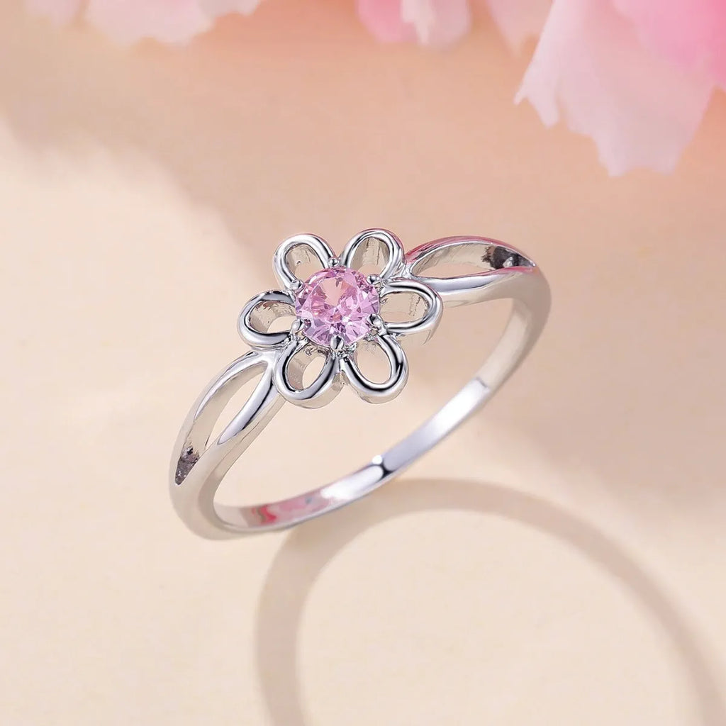 Women's electroplated copper ring with floral hollowed design in platinum pink diamond colour