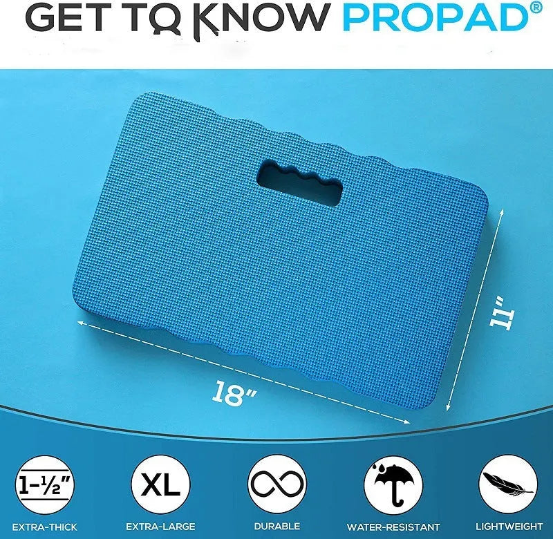 Blue EVA foam garden kneeler pad on grass, showing its rectangular shape and thickness for knee protection.