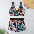 Women's two-piece printed boxer style bikini set in a multi-colour design on polyester fabric.