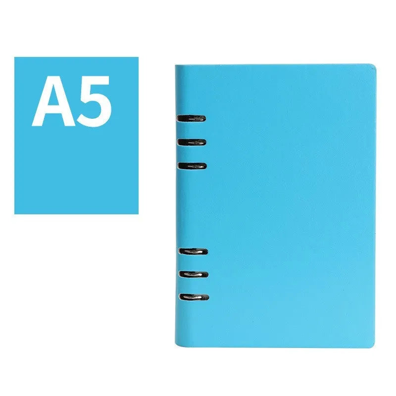 A5 loose-leaf business notebook with a black imitation leather cover, open to show beige paper.