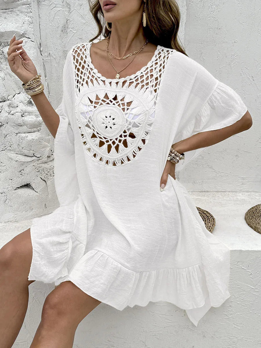 Crochet patchwork beach dress with stitching and tassel details in apricot colour.