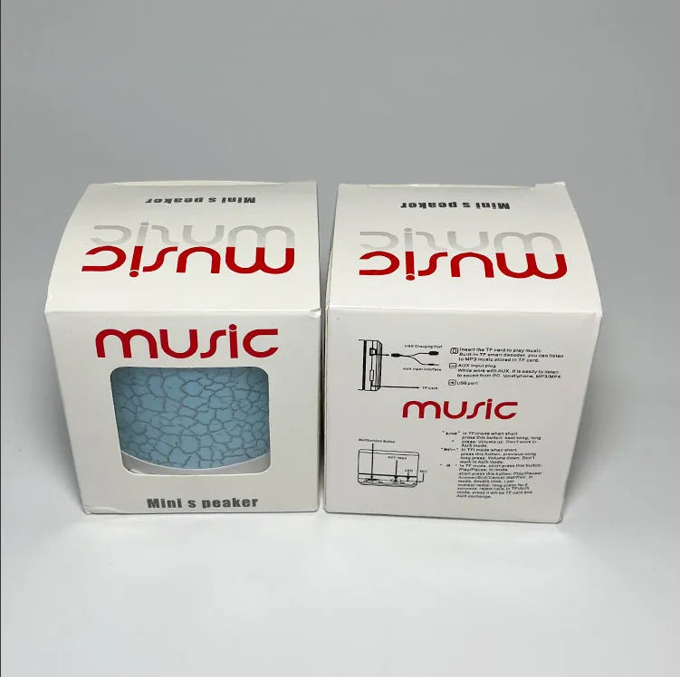 White A9 Mini Cracked Bluetooth Speaker with TF card slot and LED light
