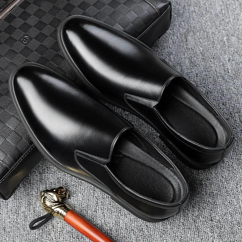 Men's black leather business casual slip-on shoes with rubber sole and sewing line detail.