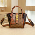 Women's portable PVC bucket messenger bag in coffee brown colour with soft handle and lined interior