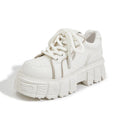 Women's beige leather casual shoes with viscose sole construction shown alongside pink version