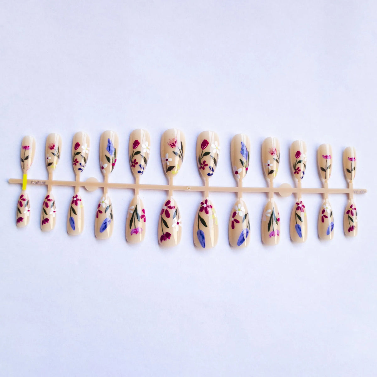 Almond-shaped removable nail wraps with European floral armour rose and tulip patterns