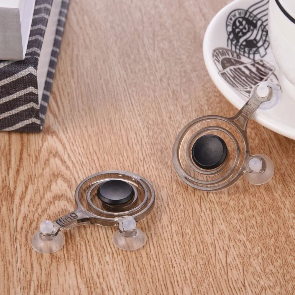 Pair of clear smartphone gaming joysticks with coloured accents on mobile phone screen