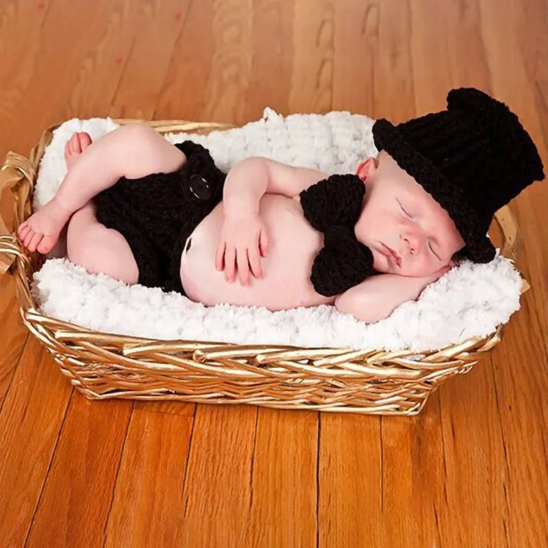Hand-knitted cartoon animal newborn photography outfit in blended spandex, available in 19 animal designs for newborn photo sessions.