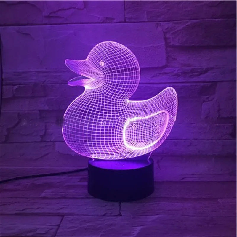 Little Yellow Duck 3D LED night light showing acrylic duck shape on ABS base, with remote control.