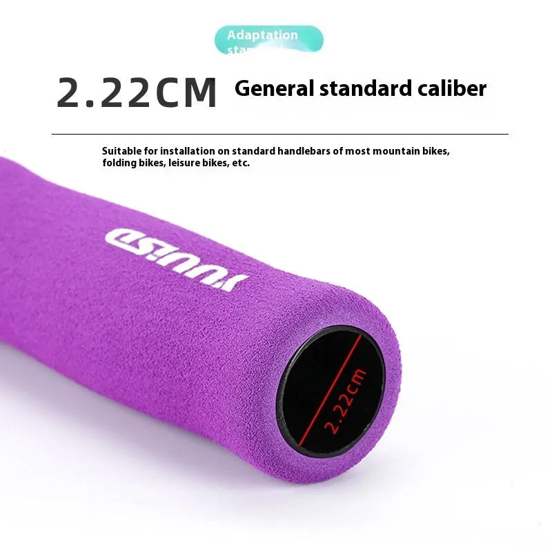 A pair of soft sponge mountain bike handlebar grips in biange colour, showcasing their lightweight 41g design.