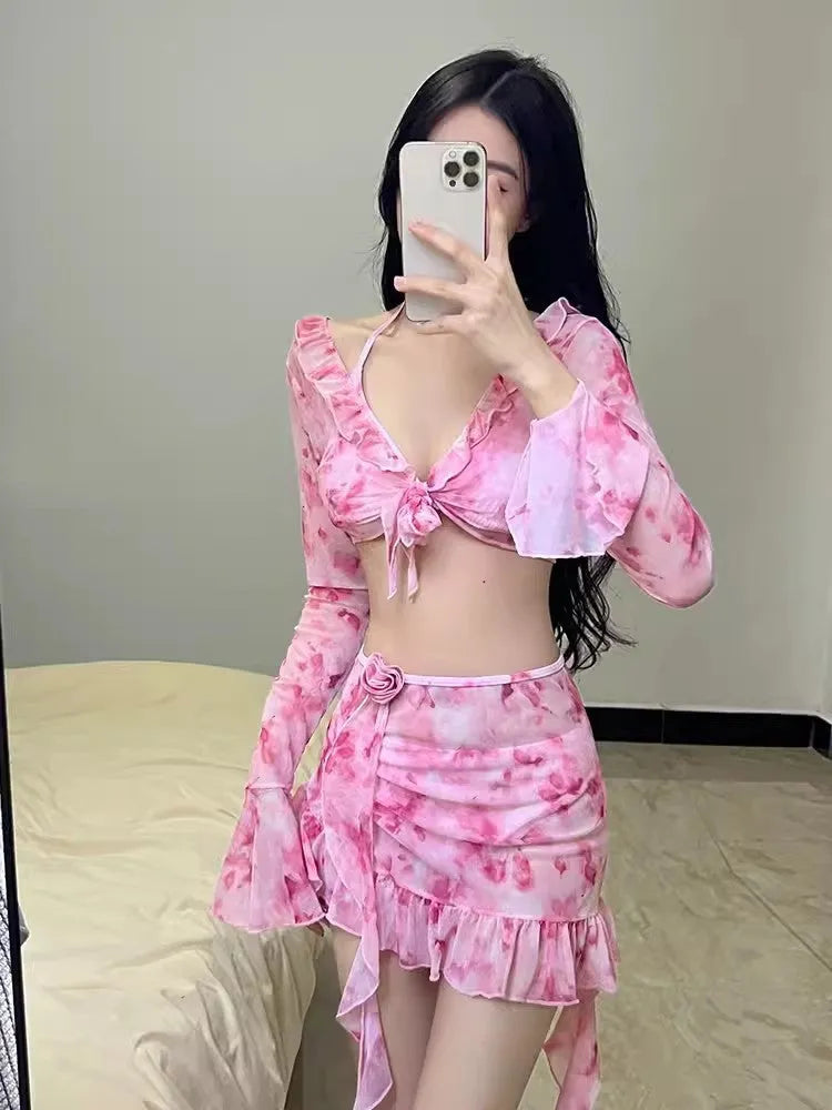 Women's floral bikini swimsuit in cherry blossom pink with matching floral print on both pieces