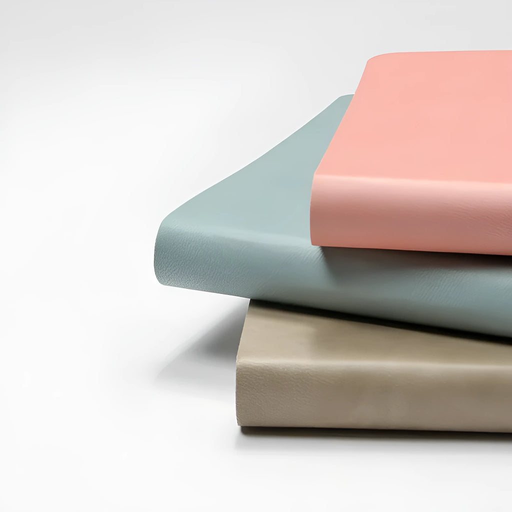 A5 dotted notebook with imitation leather cover in blue or pink, 100gsm dot grid paper and locking plastic binding