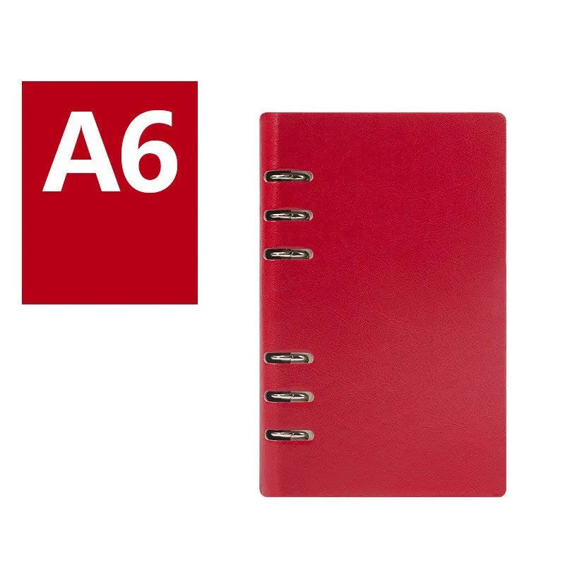 A5 loose-leaf business notebook with a black imitation leather cover, open to show beige paper.