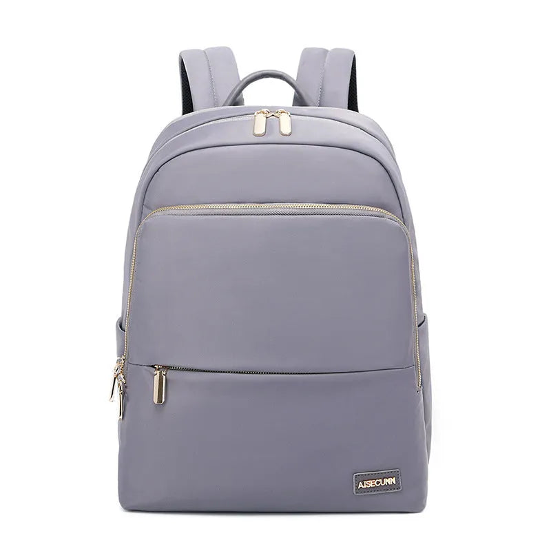 Oxford cloth women's large capacity backpack in black shown with anti-theft zip and breathable back panel.